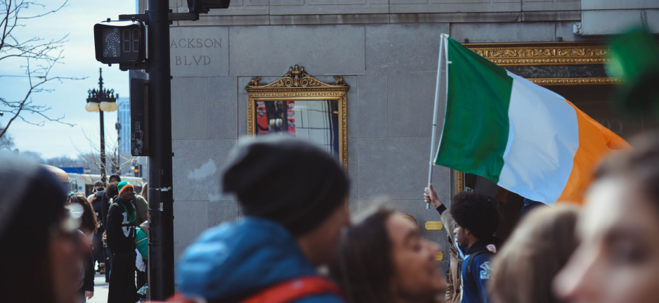 person waving irish flag